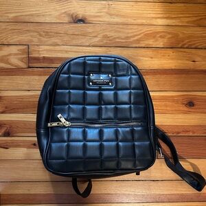 London fog quilted backpack